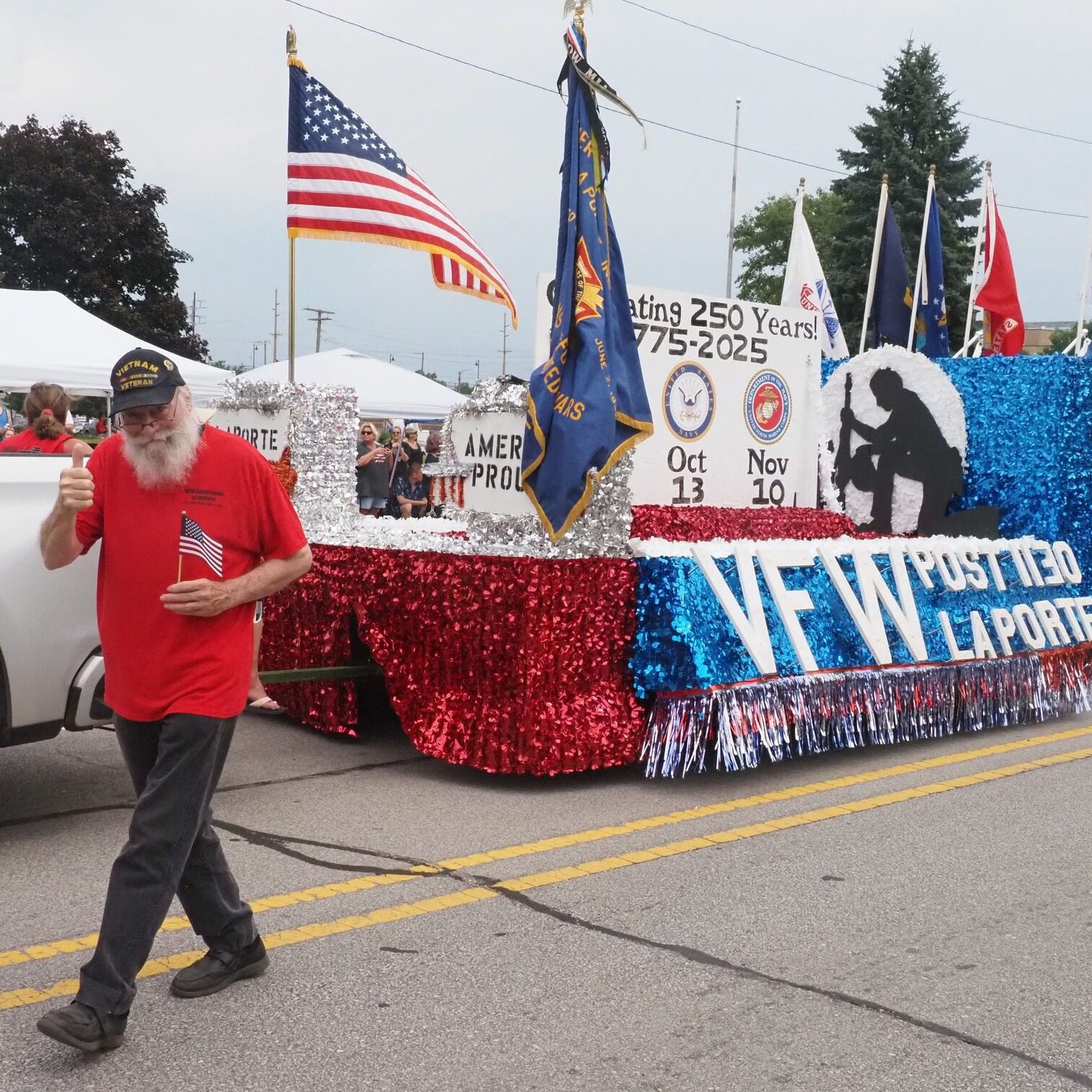 VFW Post 1130 float with American and military flags honoring veterans during the Kiwanis Fourth of July Parade in LaPorte, Indiana.